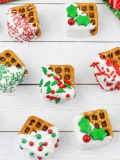 square image of the Christmas pretzel bites on a white wood background